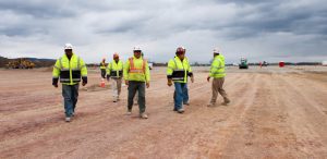 E.J. Breneman Construction Crew Walking on Soil